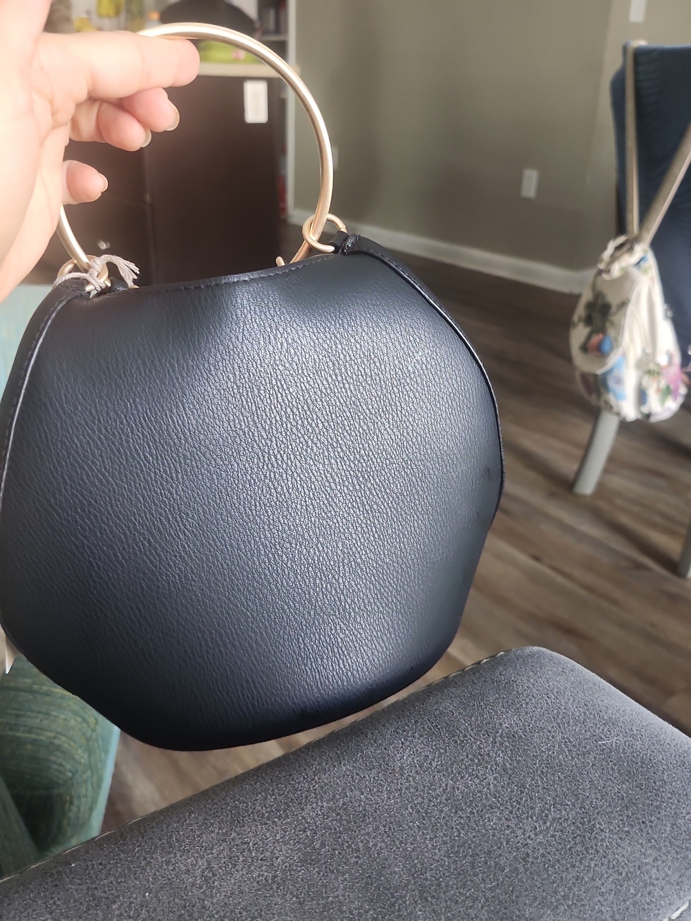 Minimalist Black Women's Handbag with Gold Ring Handle